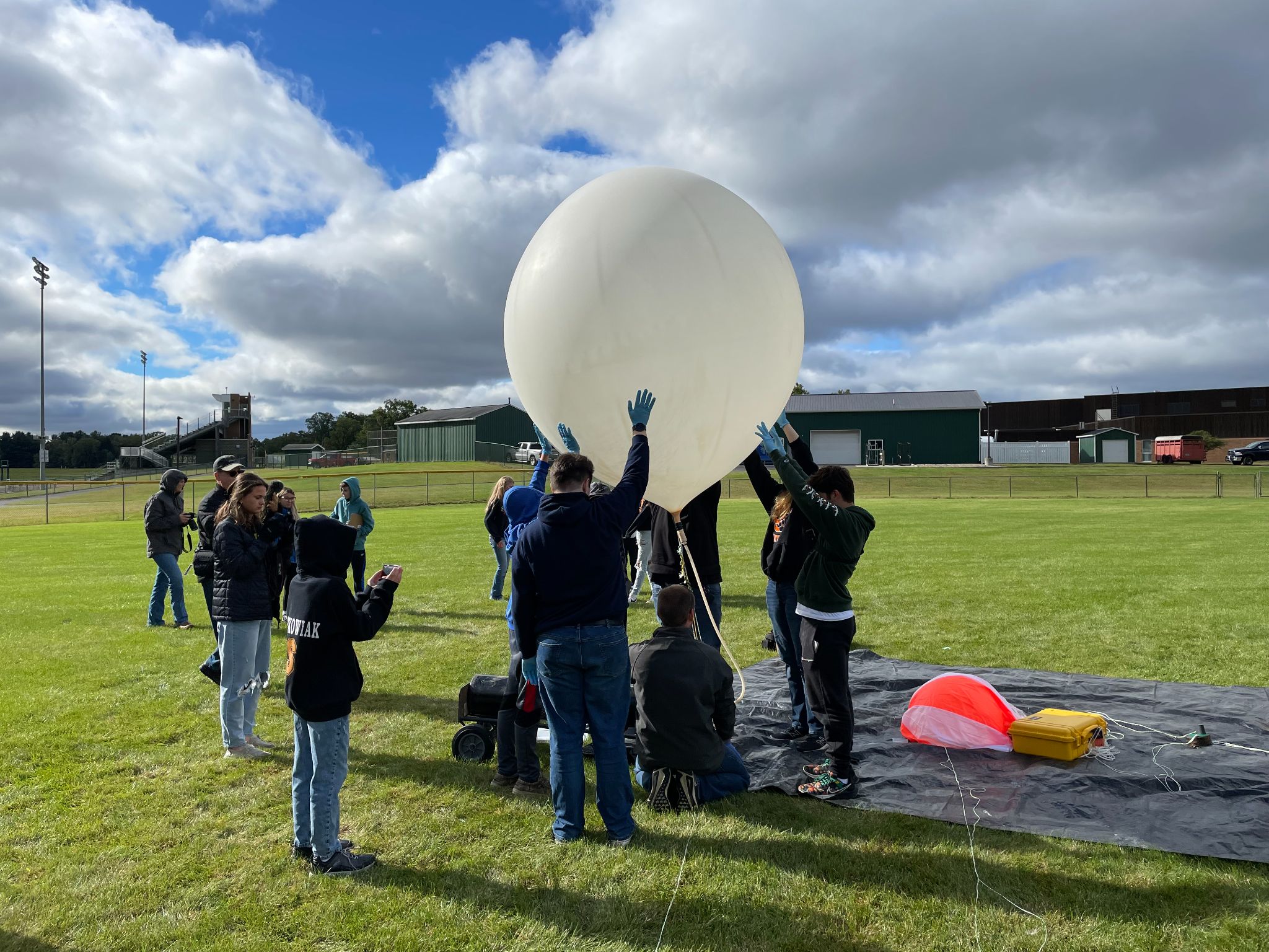 Local Students Launch High Altitude Balloon Carrying a Small Satellite