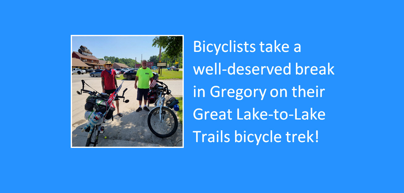 Bicyclists take a well-deserved break in Gregory on their Great Lake-to-Lake Trails bicycle trek