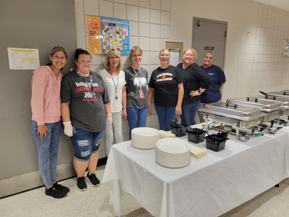 Food-service staff prepare a breakfast appreciated by all the SCS staff.